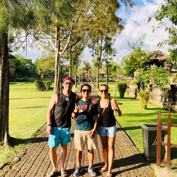 A group of guests in the gardens on a Bali tour
