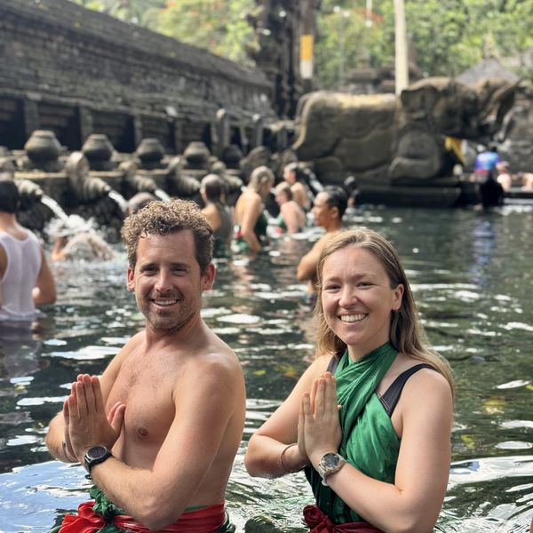 Guests cooling off at the holy springs in Bali